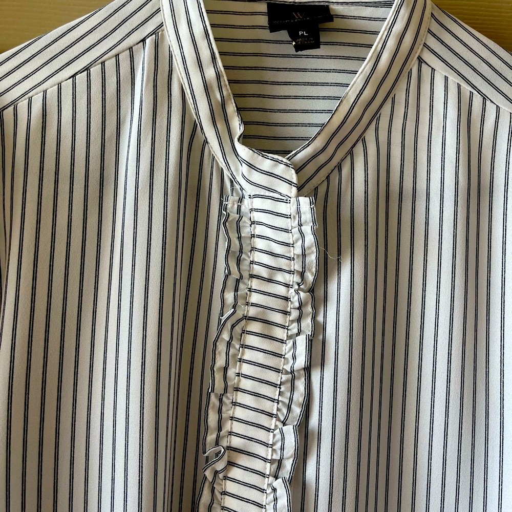 Business type shirt looks great under a black jacket